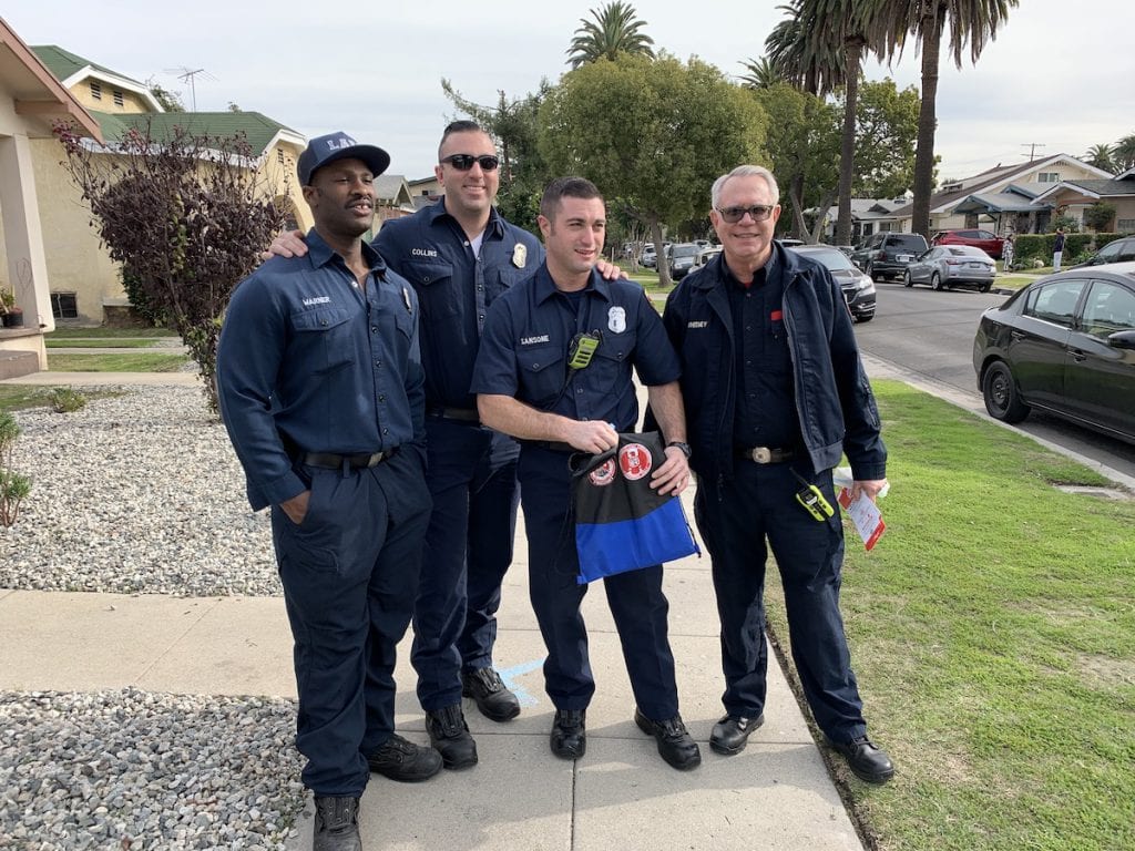 Firefighters and MySafe:LA members pose for a photo.